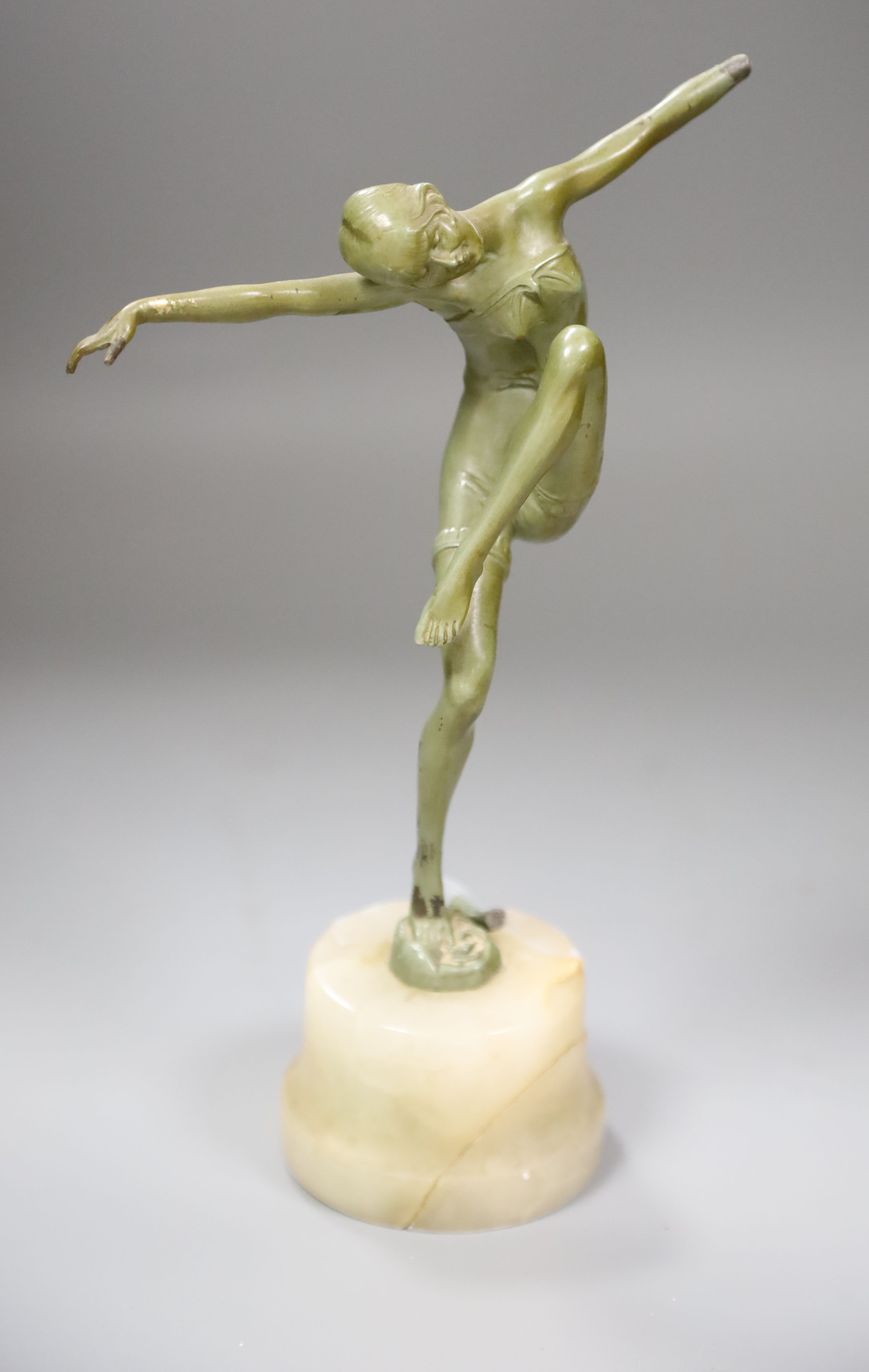 An Art Deco bronzed spelter model of a dancer, on an onyx plinth, height 25cm (a.f.)